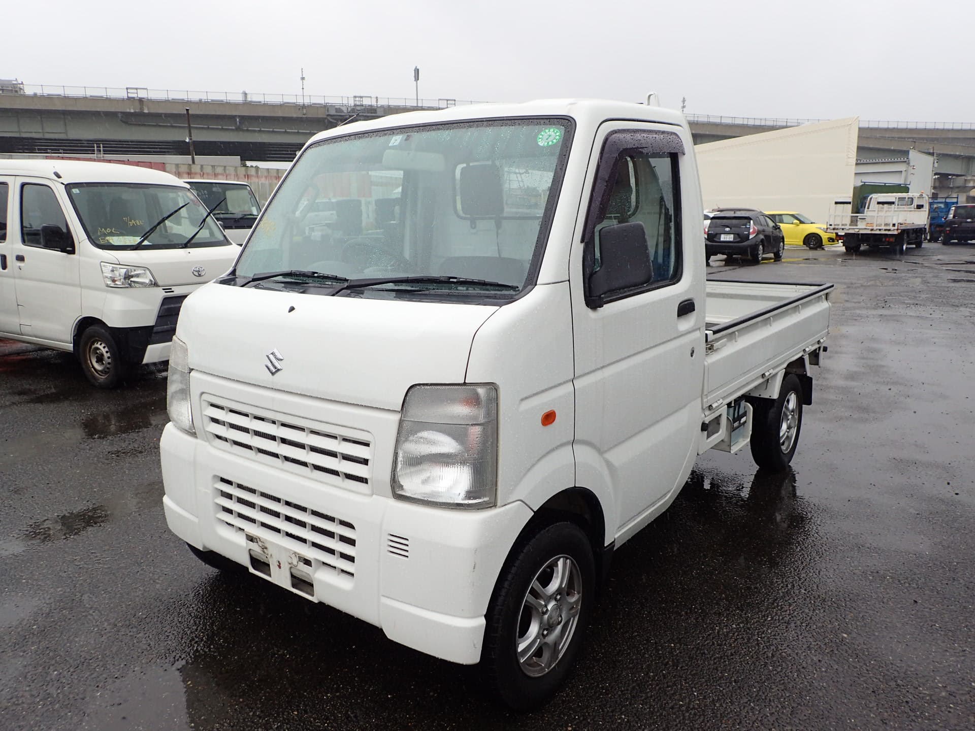 2010 Suzuki Carry Truck Flatbed 4WD 5-Speed Manual Super Low Kms — kei truck for sale in Calgary