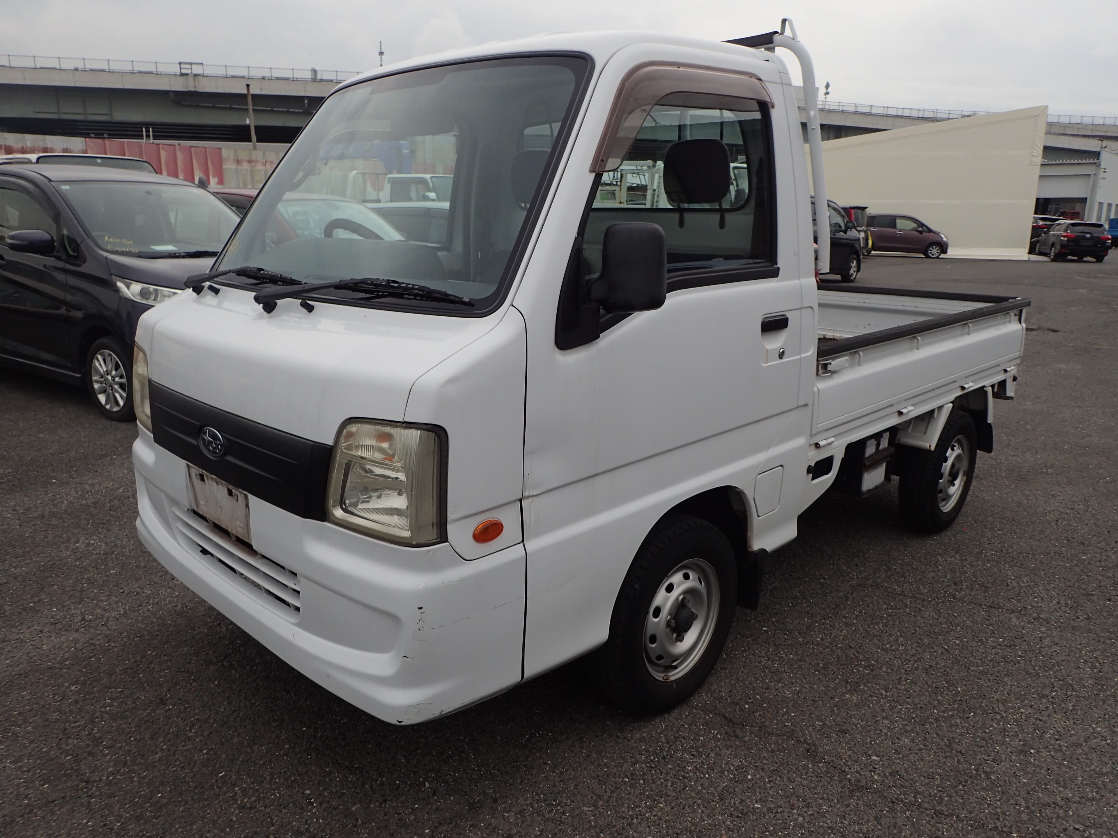 2007 Subaru Sambar Supercharged Flatbed 4WD 5-Speed MANUAL — kei truck for sale in Calgary
